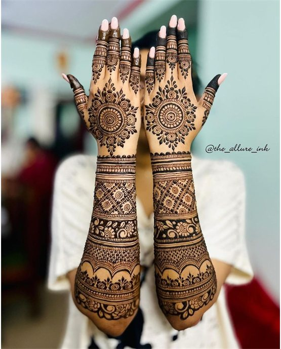 Heavy Motif With Outline Featuring Modern Full Hand Mehndi Design